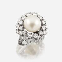 A cultured pearl, diamond, and eighteen karat white gold ring