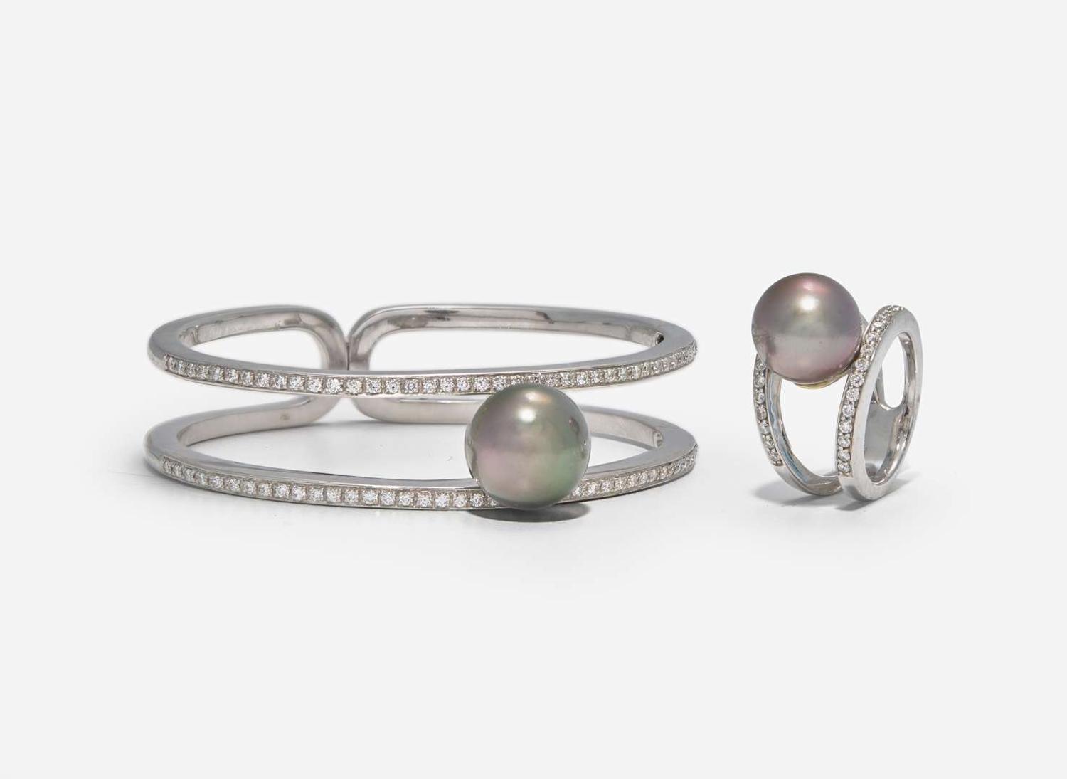 An 18K White Gold, Diamond, and Pearl Bracelet and Ring