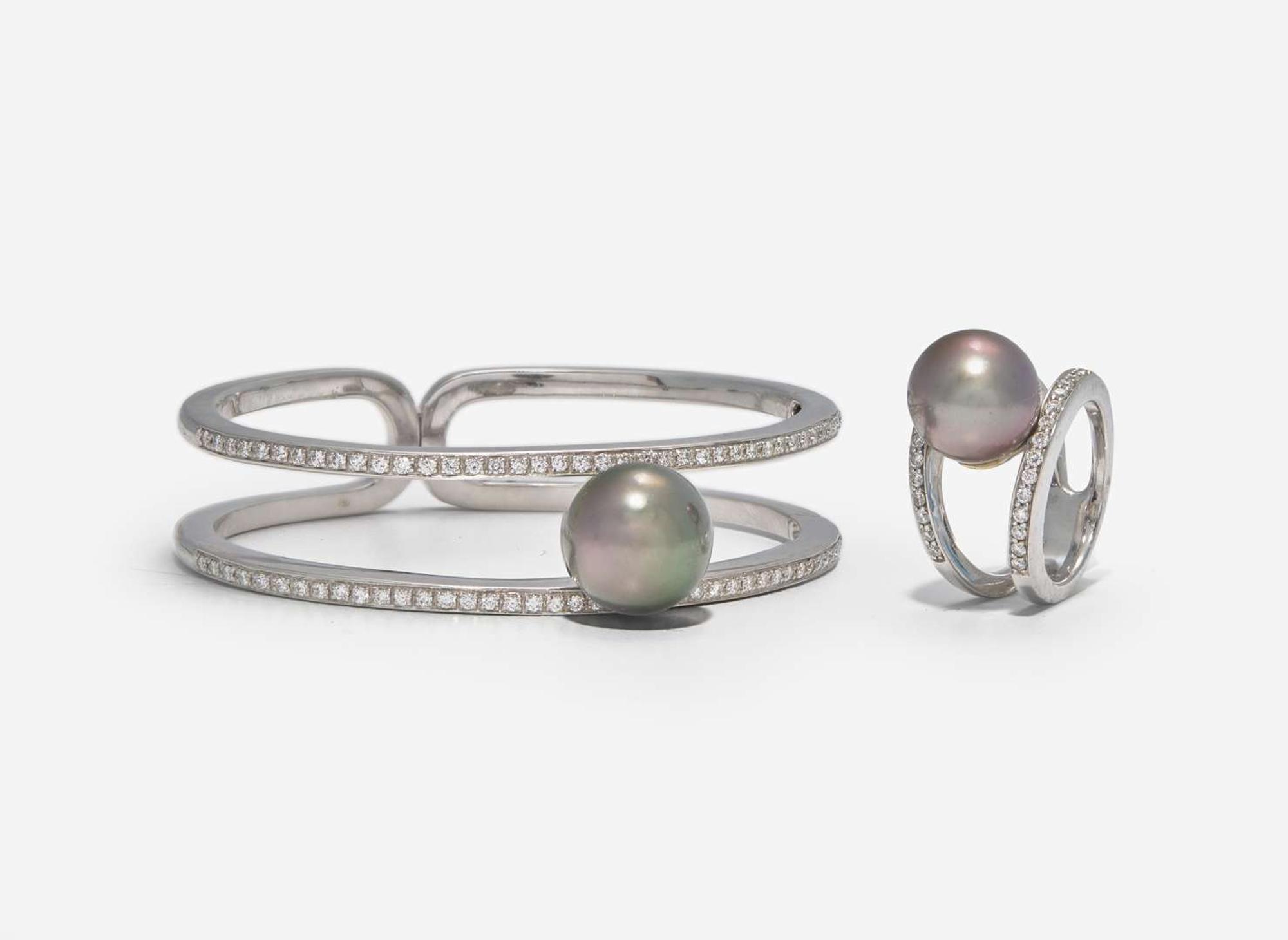 An 18K White Gold, Diamond, and Pearl Bracelet and Ring
