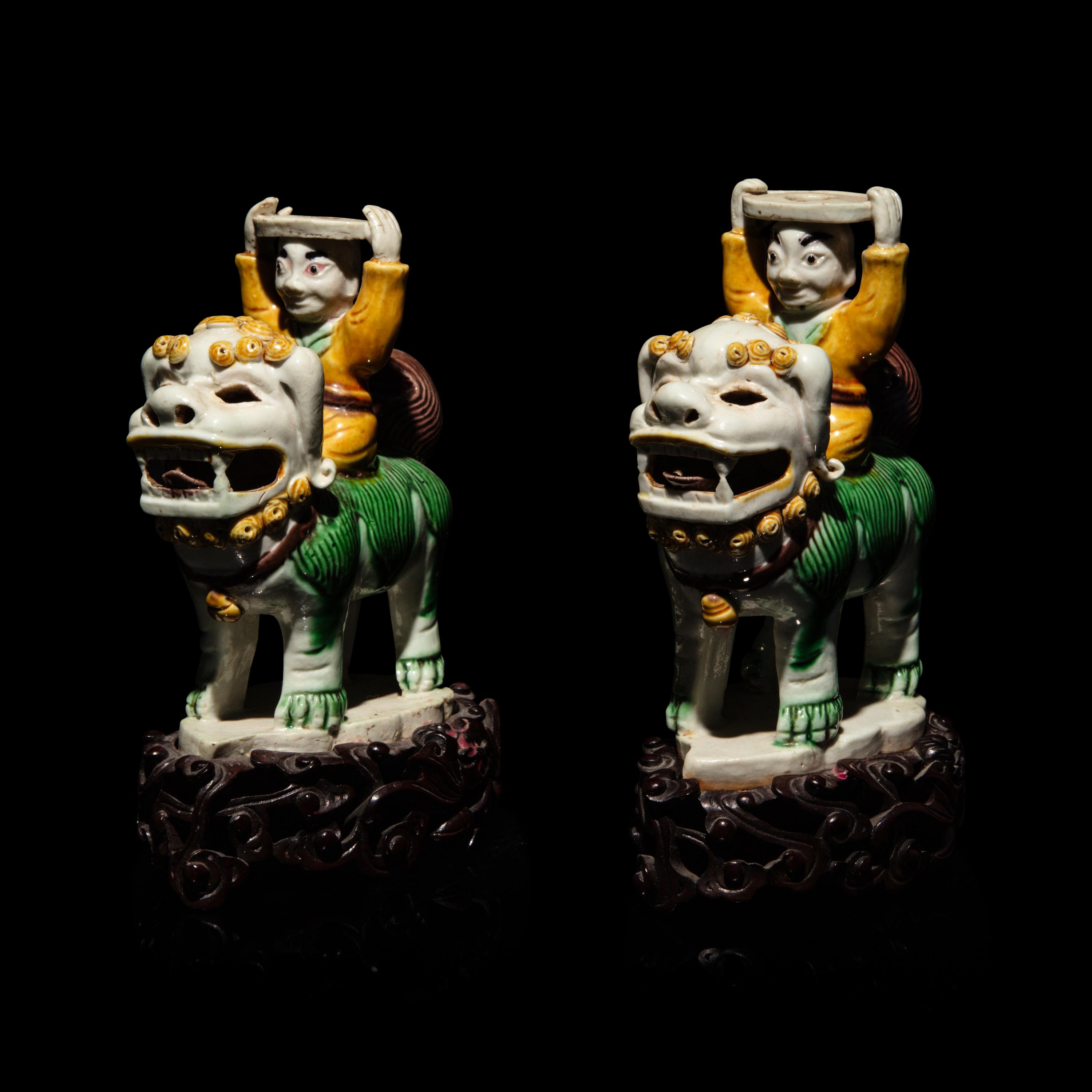 A Pair of Small Chinese Enameled Figures on Lions