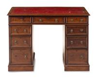 An Edwardian Walnut Pedestal Desk