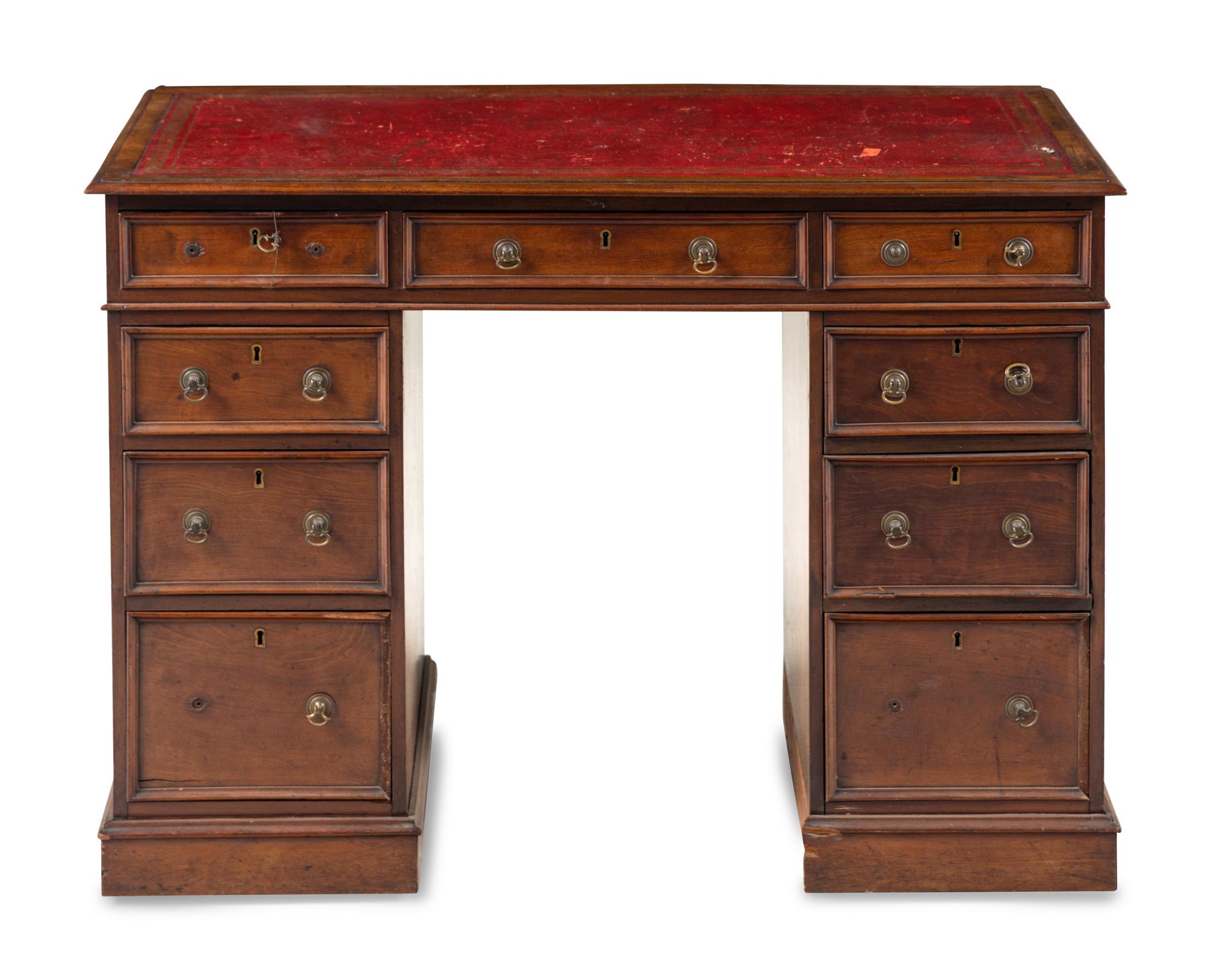 An Edwardian Walnut Pedestal Desk