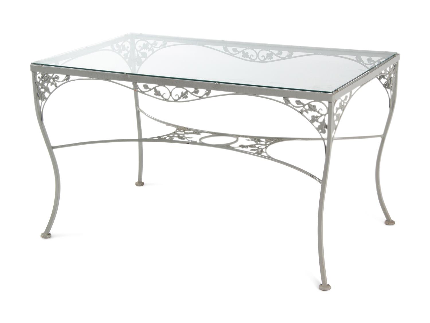 A Woodard "Orleans" Style Painted Iron Garden Table and Four Chairs