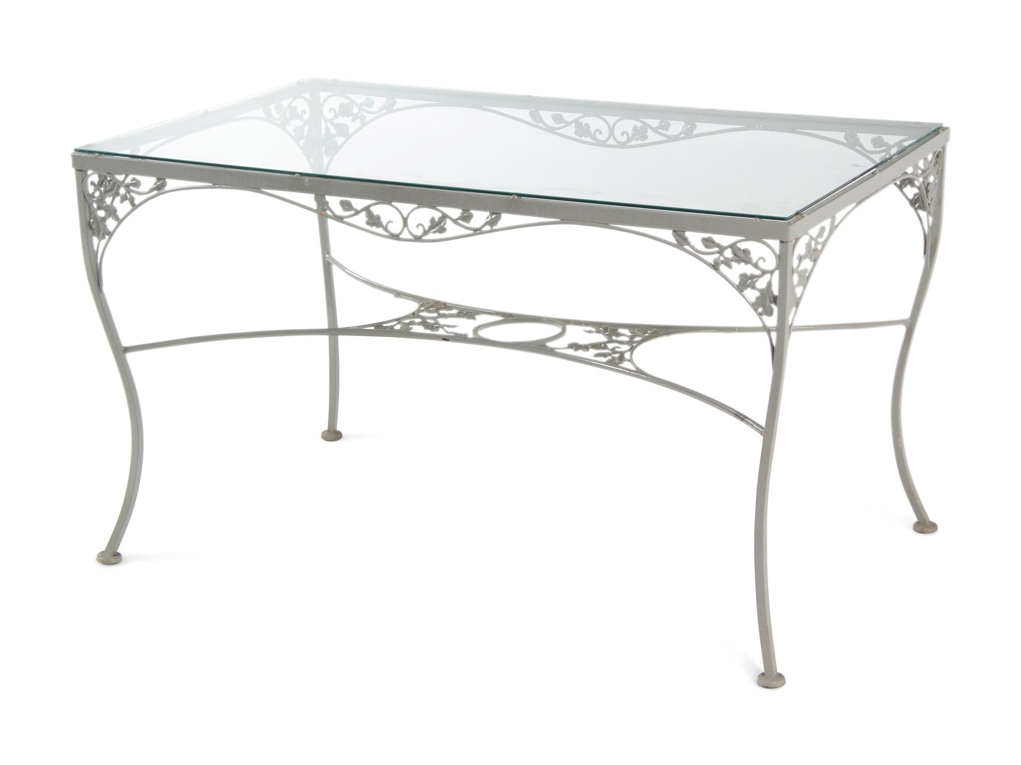 A Woodard "Orleans" Style Painted Iron Garden Table and Four Chairs