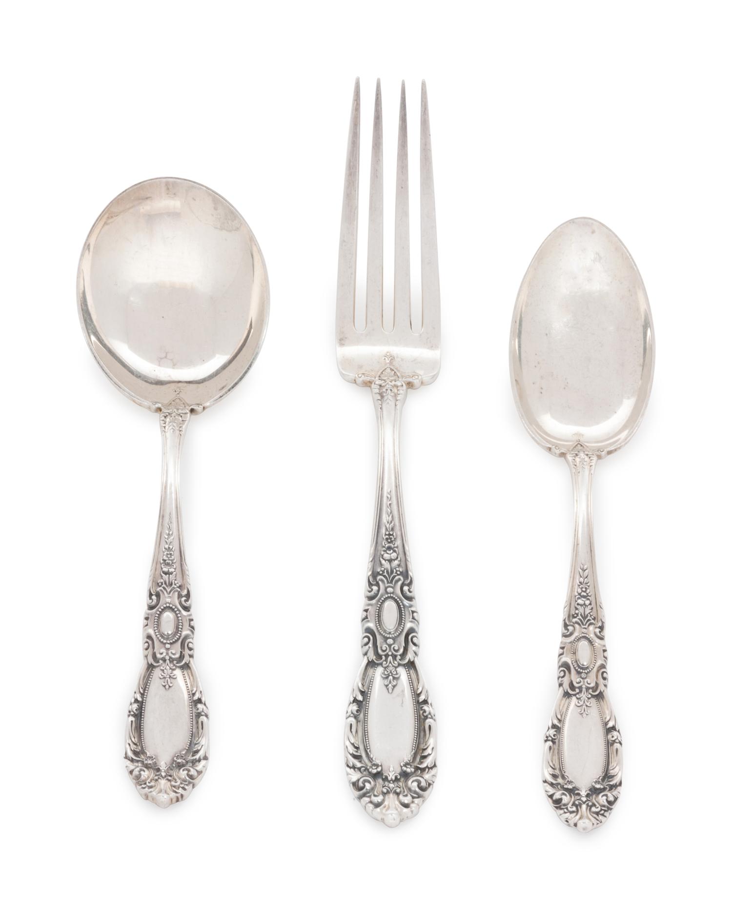 King Richard pattern, comprising: 5 butter spreaders with stainless steel blades 12 dinner forks 12 salad forks 1 meat fork 1 lemon fork 1 pickle fork 2 serving spoons 24 teaspoons 12 soup spoons 1 fruit spoon 12 iced tea spoons 2 youth forks 85 pieces total.