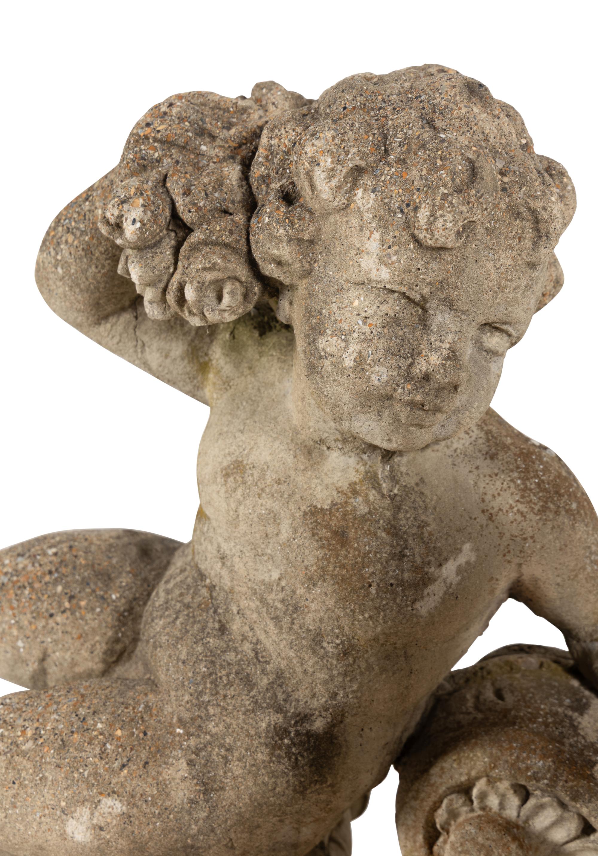 A Pair of Cast Stone Garden Ornaments