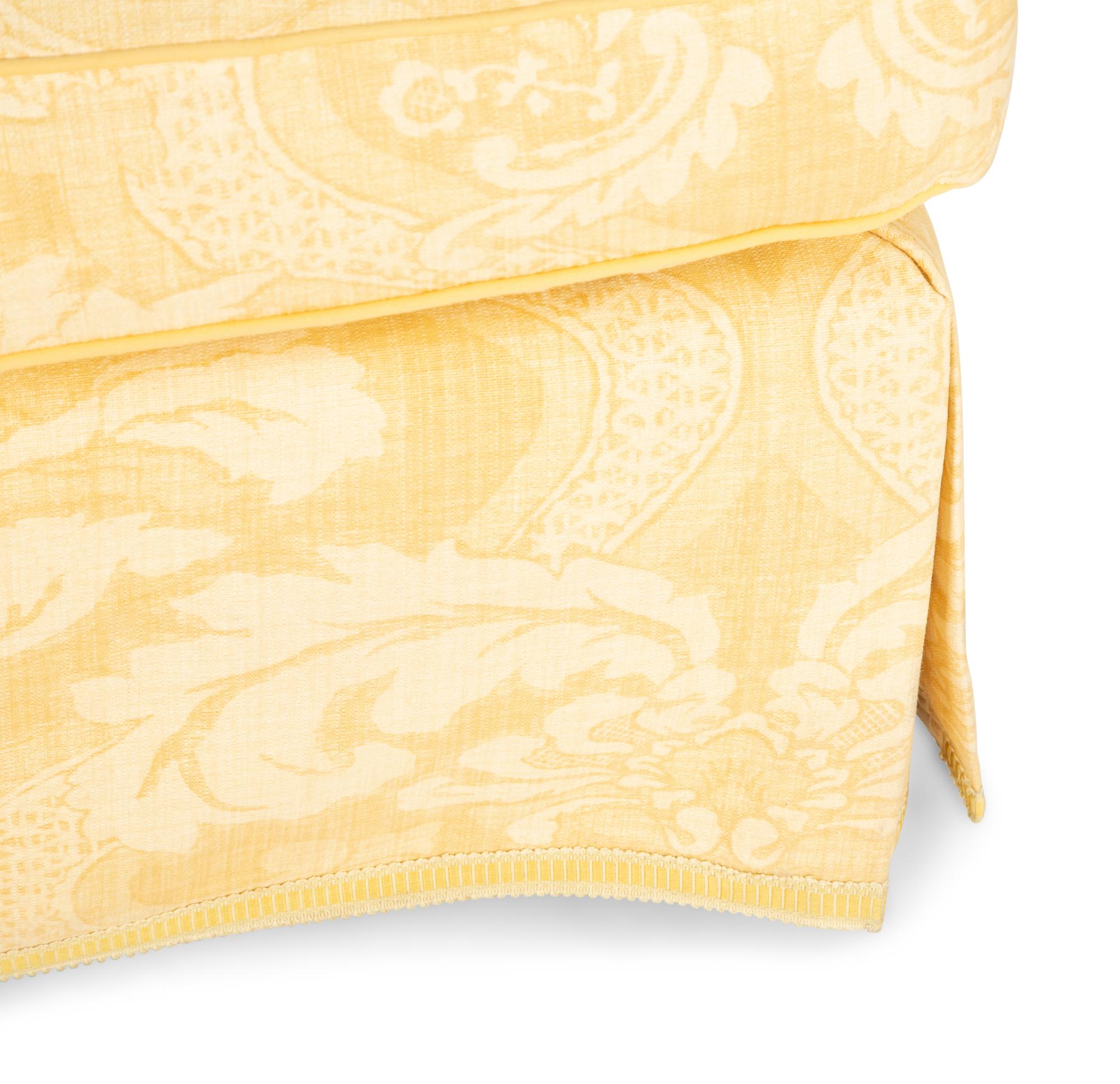 A Yellow-Cotton Upholstered Easy Chair