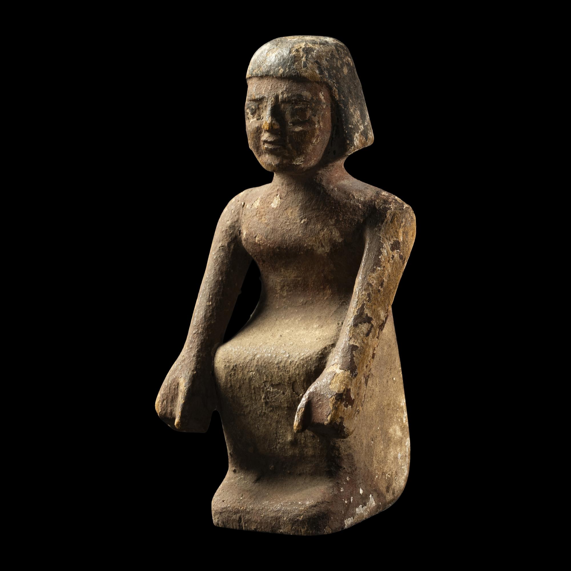 An Egyptian Painted Wood Boatman
