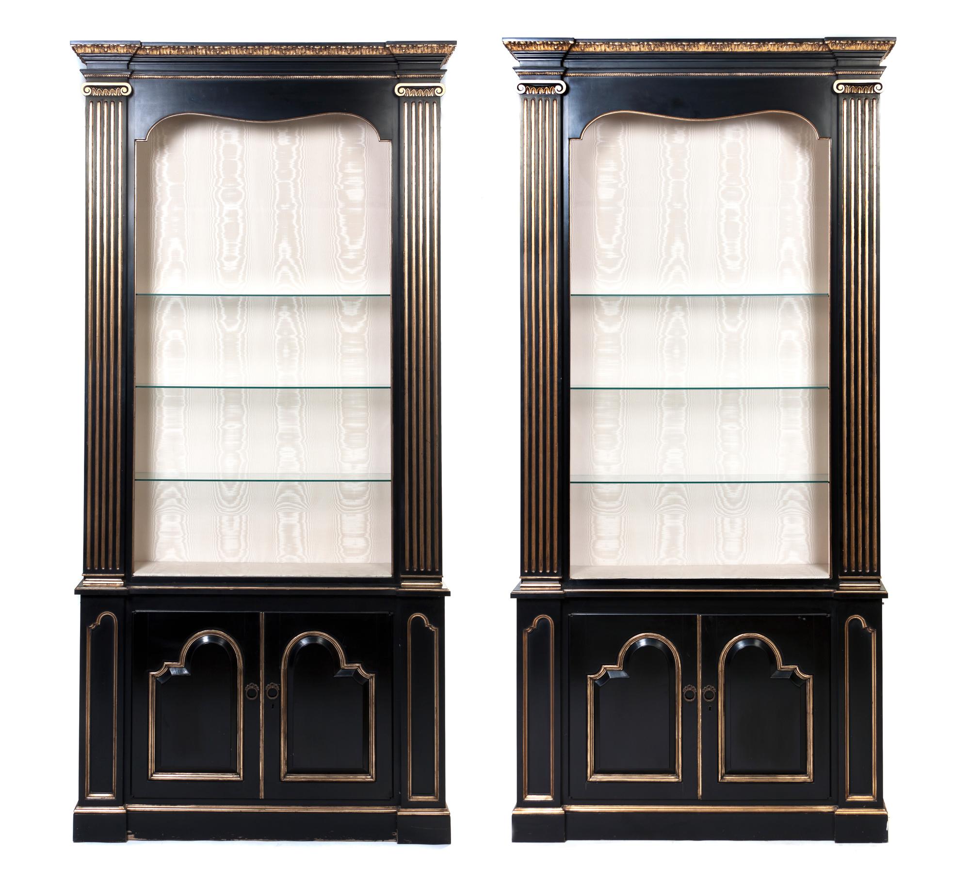 A Pair of Neoclassical Painted and Parcel Gilt Cabinets, Height 97 x width 46 x depth 12 5/8 inches.