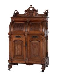 A Renaissance Revival Carved and Burl Walnut Wooton Desk