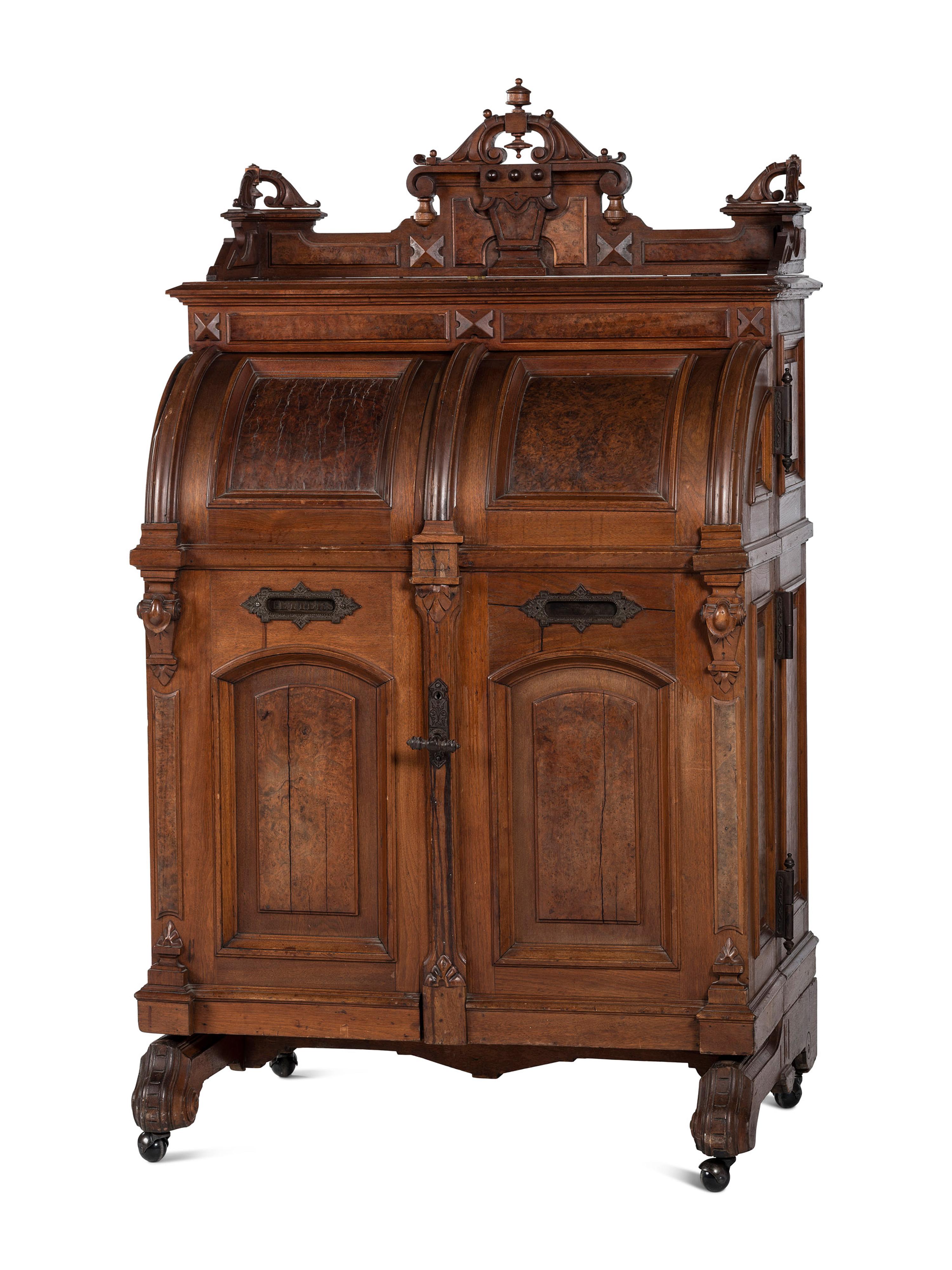A Renaissance Revival Carved and Burl Walnut Wooton Desk