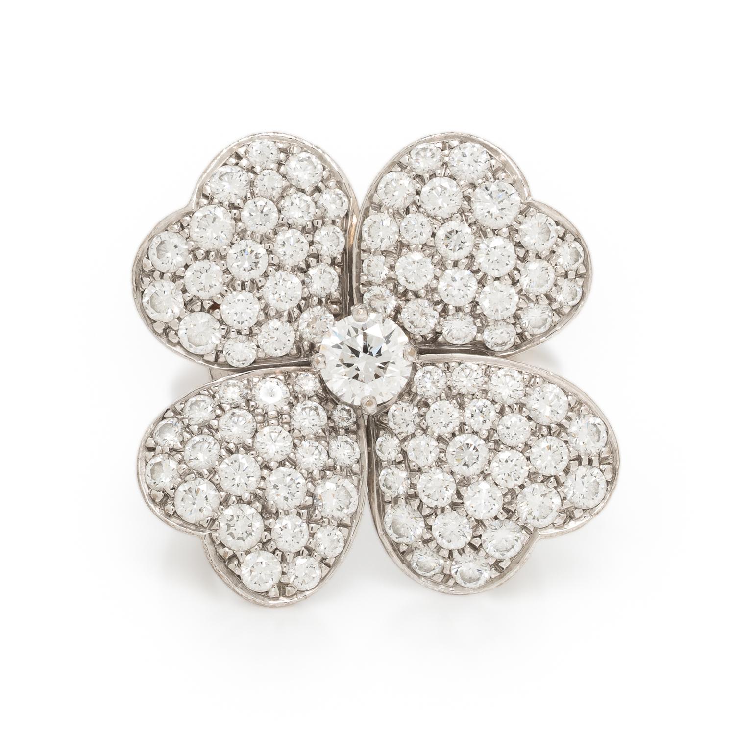 VAN CLEEF & ARPELS, DIAMOND AND WHITE GOLD 'COSMOS' RING