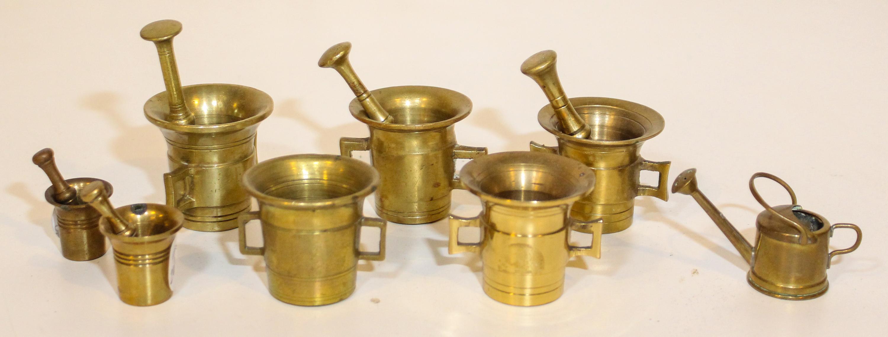 Eight Brass Diminutive Articles. Height of tallest 2 inches.