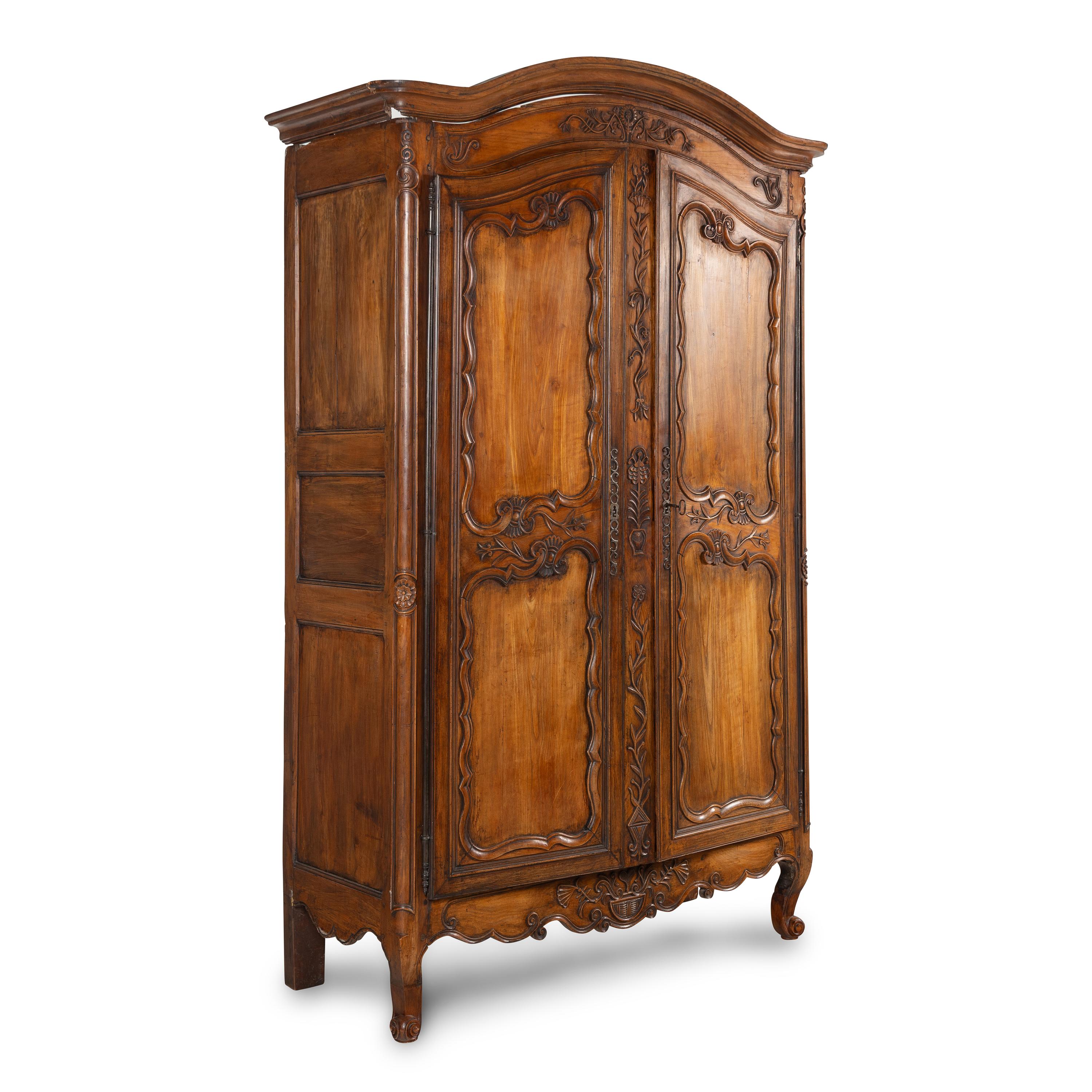A Louis XV Provincial Walnut Armoire