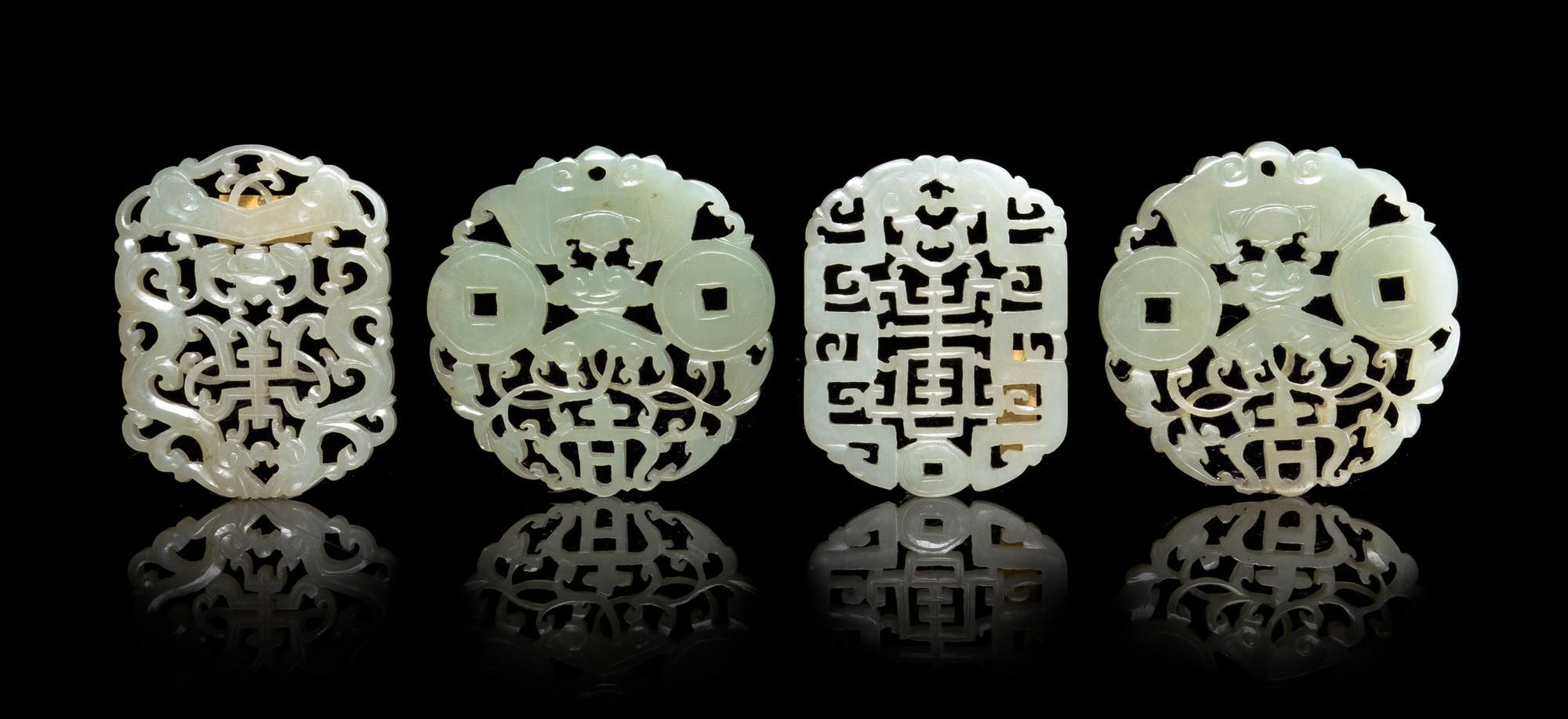 Four Pale Celadon Jade Pendants Height of largest 2 1/4 inches. — 18TH/19TH CENTURY