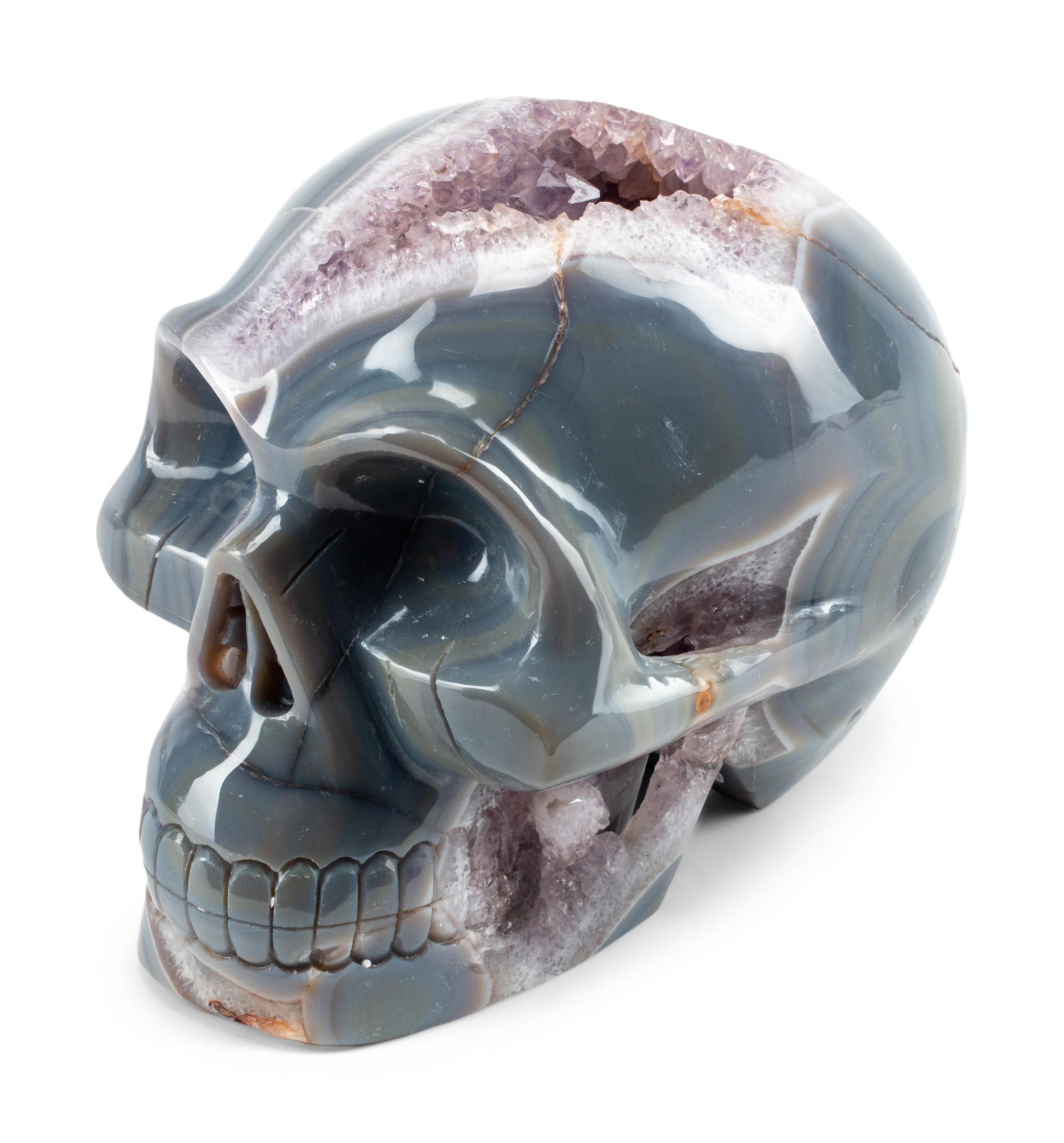 A Continental Carved Agate Geode Skull
