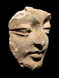 Four Gandharan Fragmentary Stucco Heads and One Bust