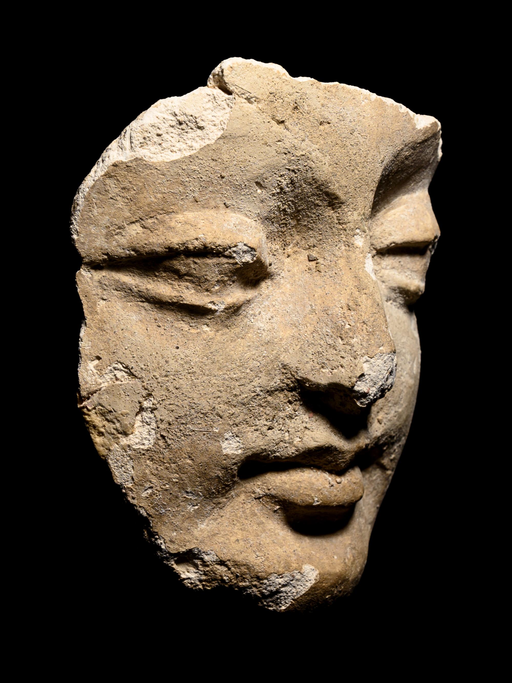 Four Gandharan Fragmentary Stucco Heads and One Bust