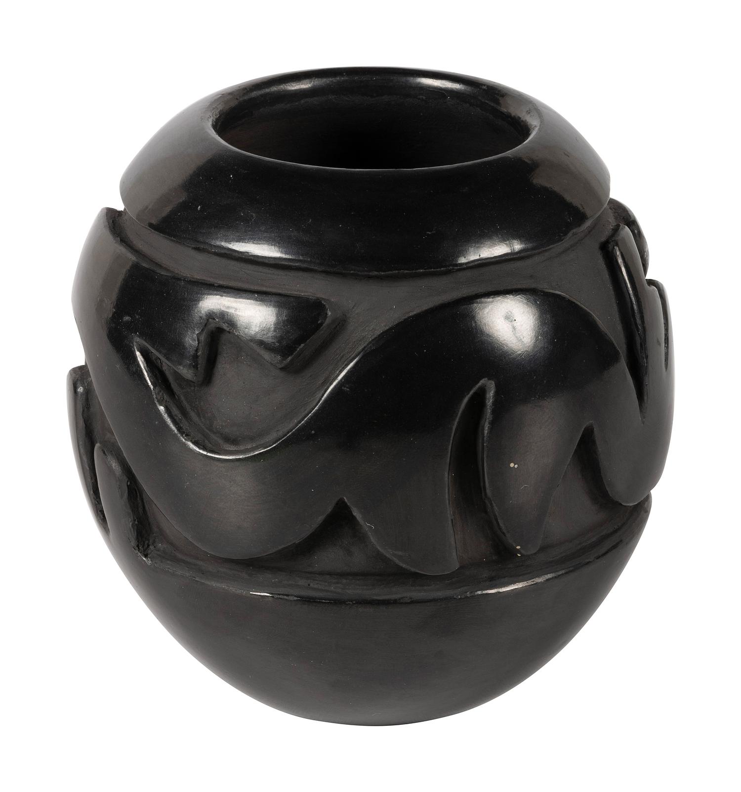 Deeply Carved Blackware Pottery Jar, with Avanyu