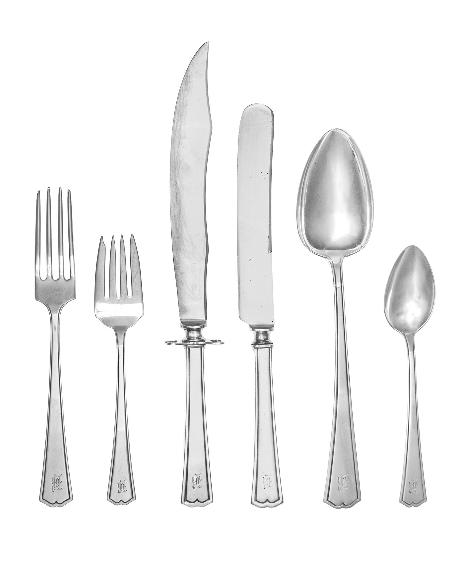 An American Silver Flatware Service, Alvin Mfg. Co., Providence, RI, Chippendale pattern, comprising: 6 dinner knives 6 butter spreader