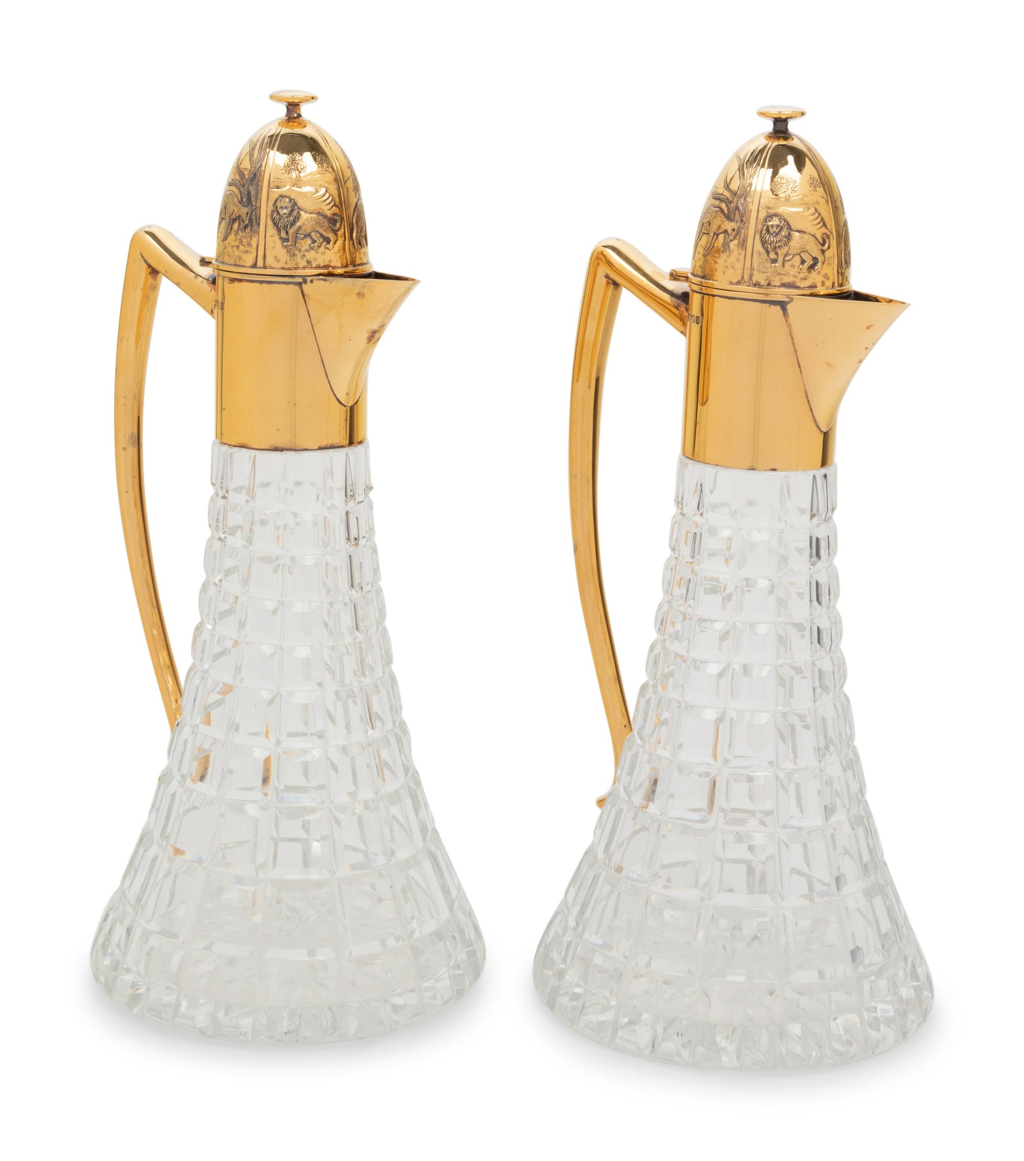 A Pair of English Silver-Gilt Mounted Cut Glass Decanters