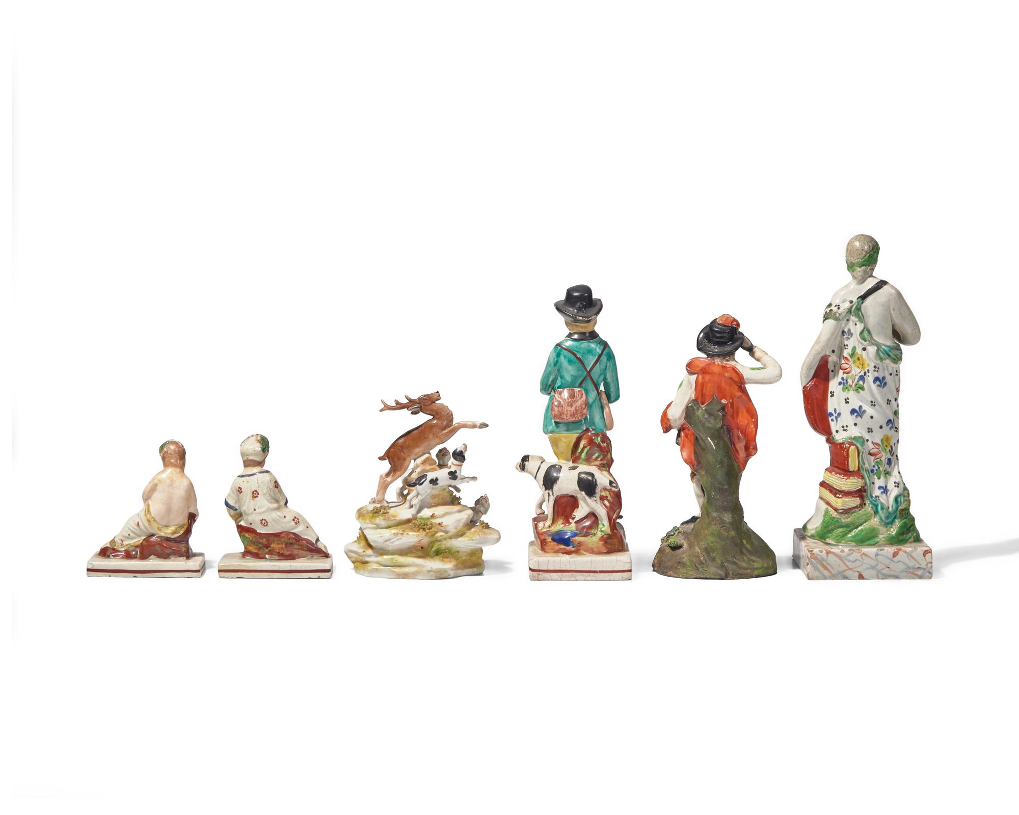 A collection of nine Staffordshire figures, England, late 18th / early 19th century