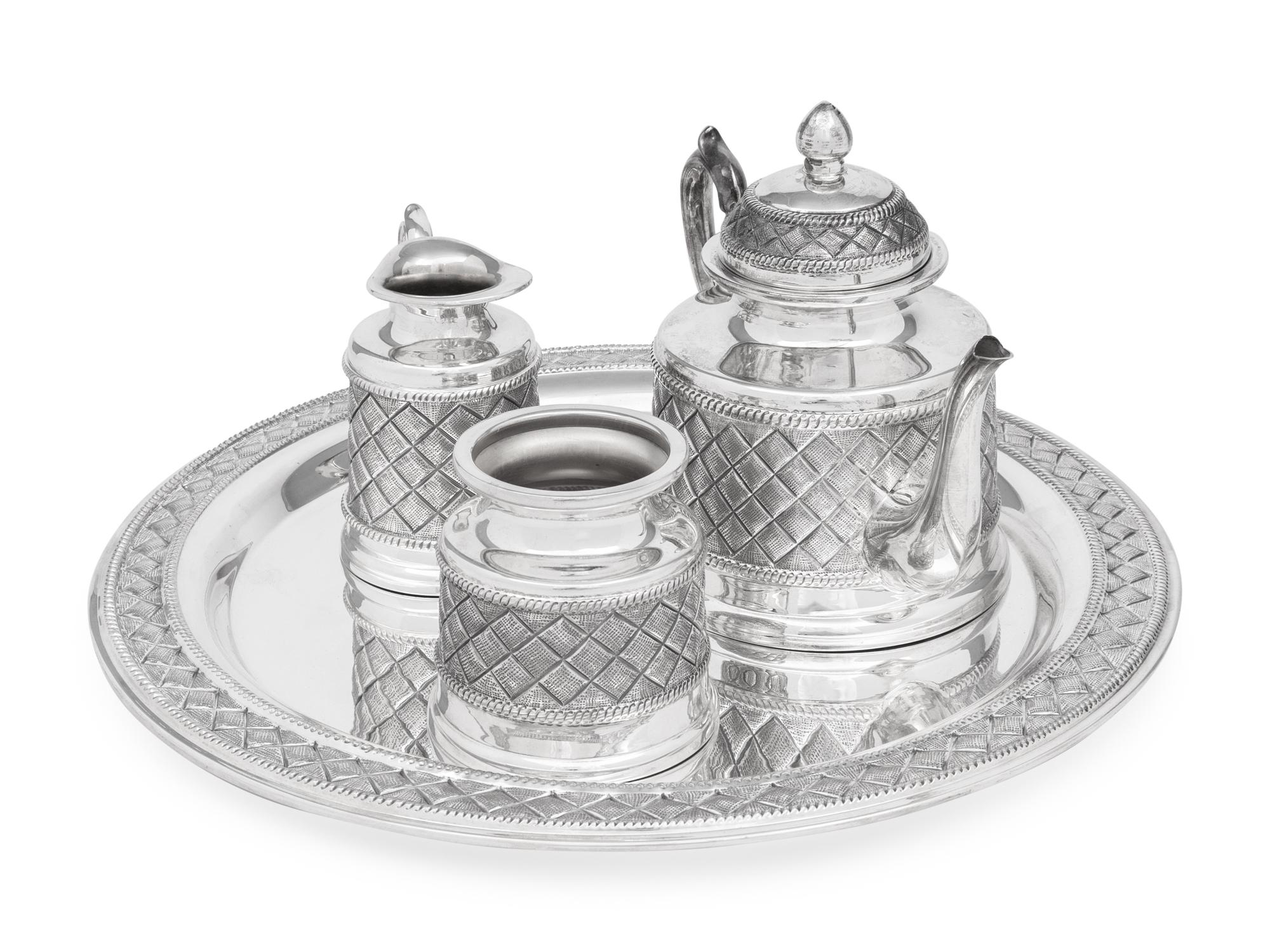A Peruvian Silver Four-Piece Tea Service