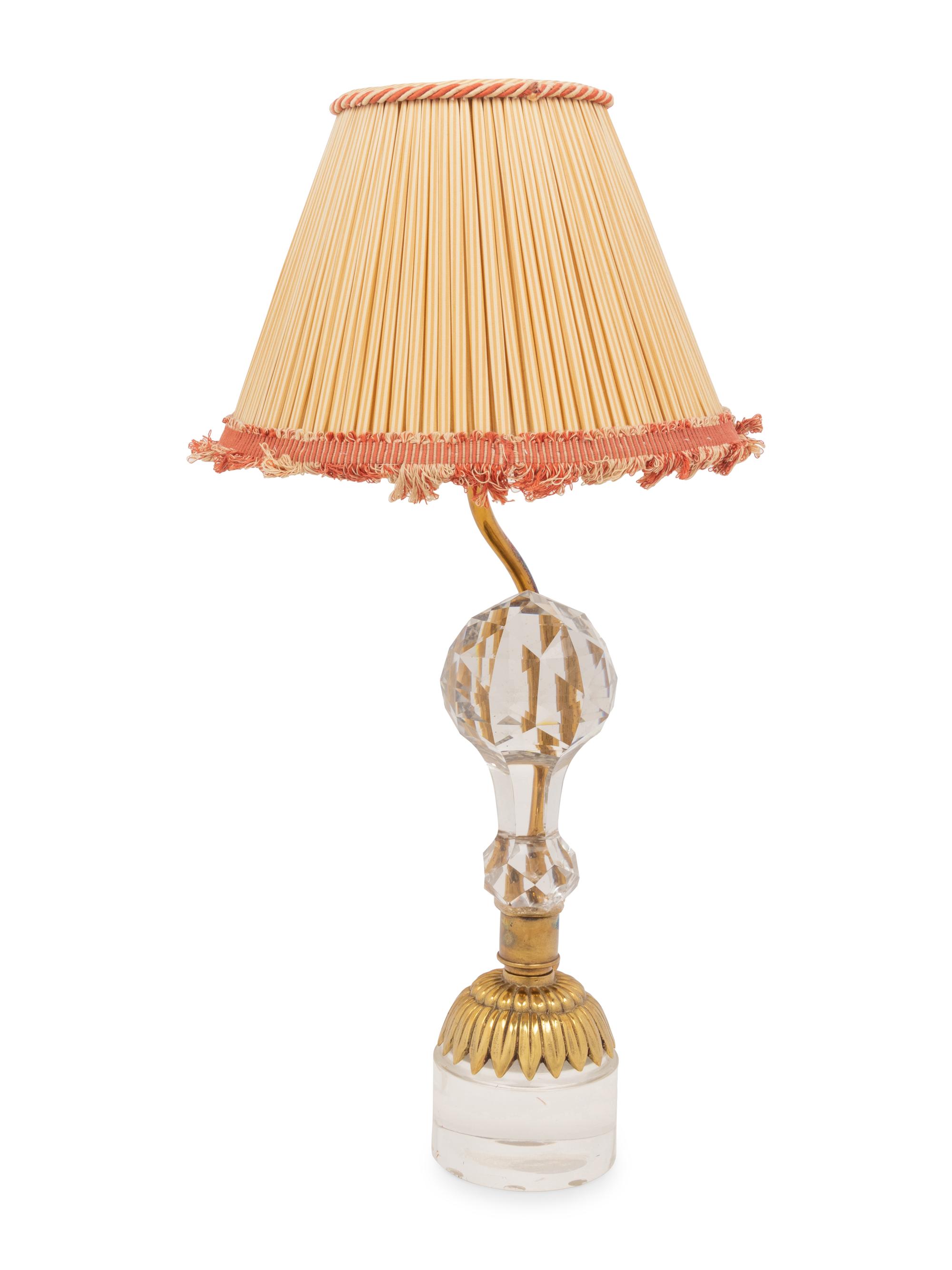 APPROVED FOR DONATION A Gilt Metal Mounted Cut Glass Table Lamp with a Pleated Silk Shade