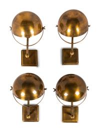 A Set of Four Brass Wall Lights
