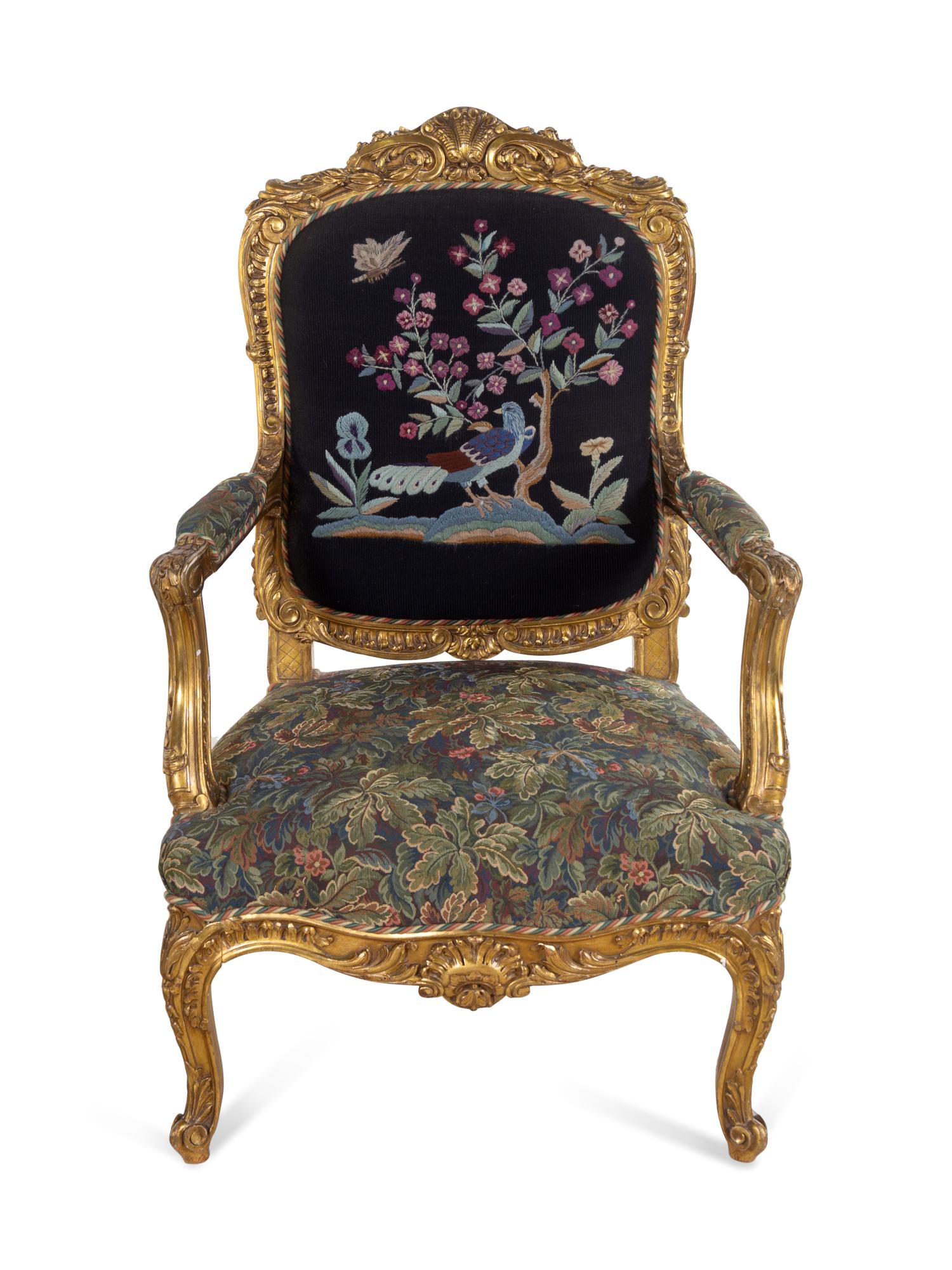 A Pair of Louis XV Style Carved Giltwood Fauteuils