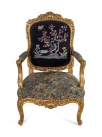 A Pair of Louis XV Style Carved Giltwood Fauteuils
