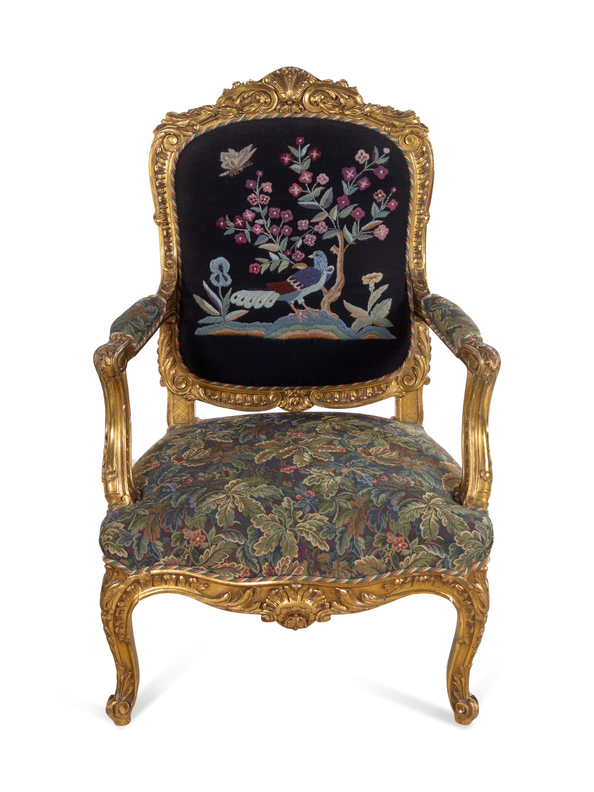 A Pair of Louis XV Style Carved Giltwood Fauteuils