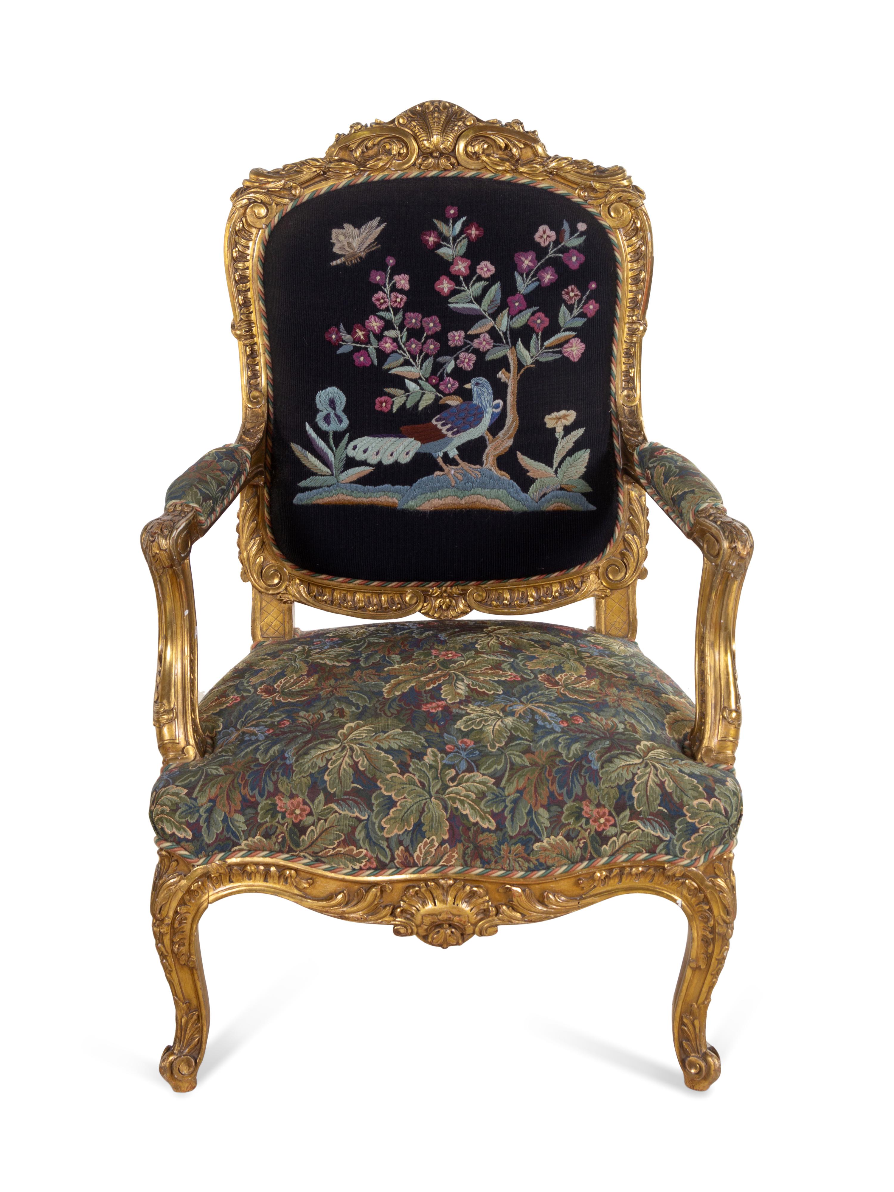 A Pair of Louis XV Style Carved Giltwood Fauteuils