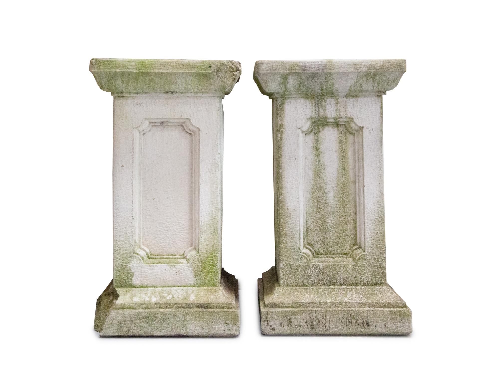 A Pair of Neoclassical Style Cast Stone Jardinières on Plinths