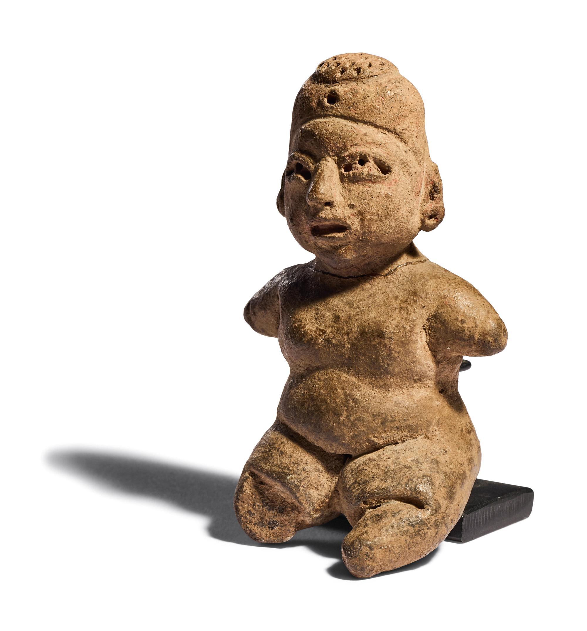 An Olmec Terracotta Seated Infant