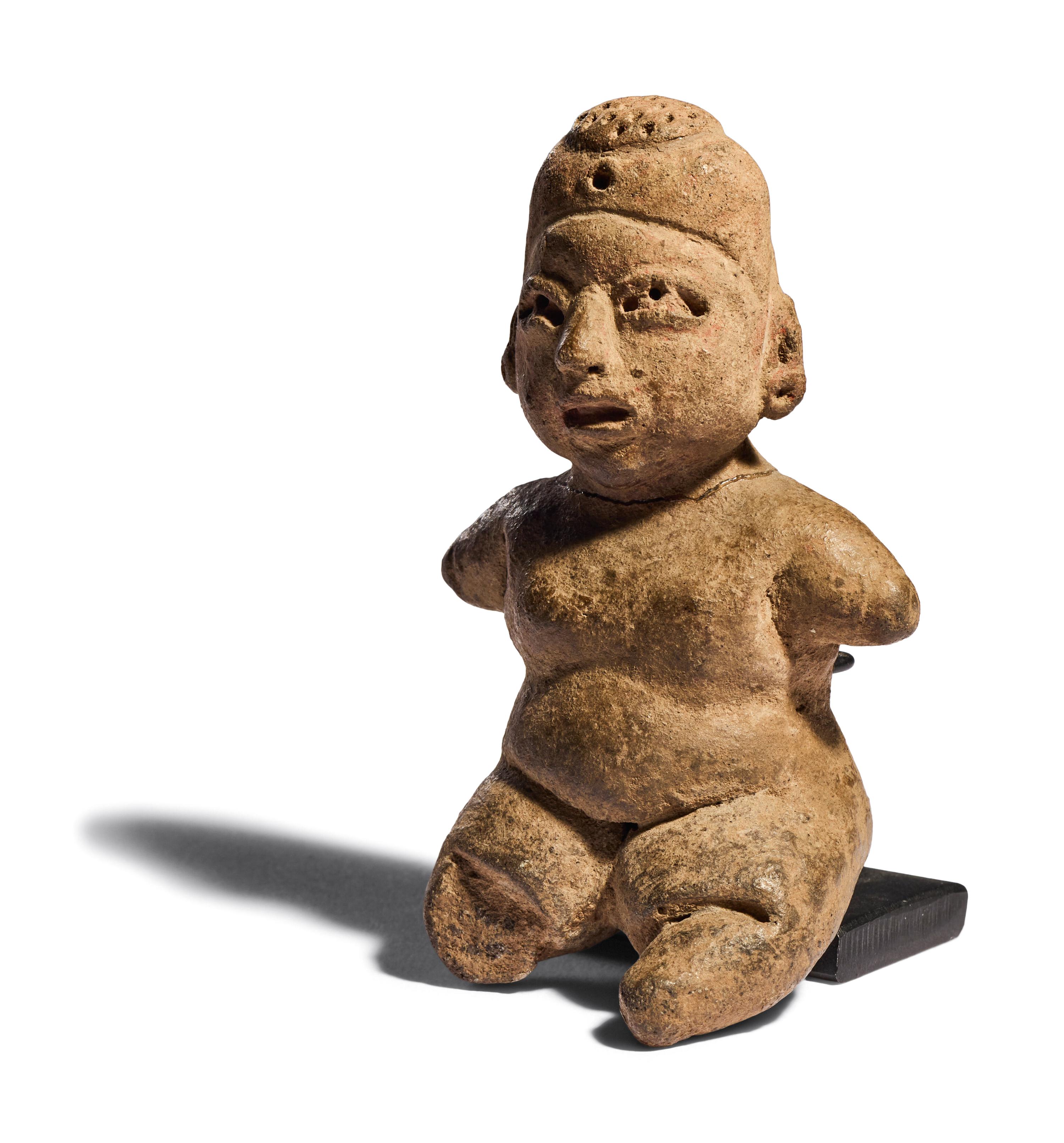 An Olmec Terracotta Seated Infant