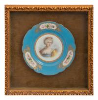 A Group of Seven Framed Sèvres Style Porcelain Plates
