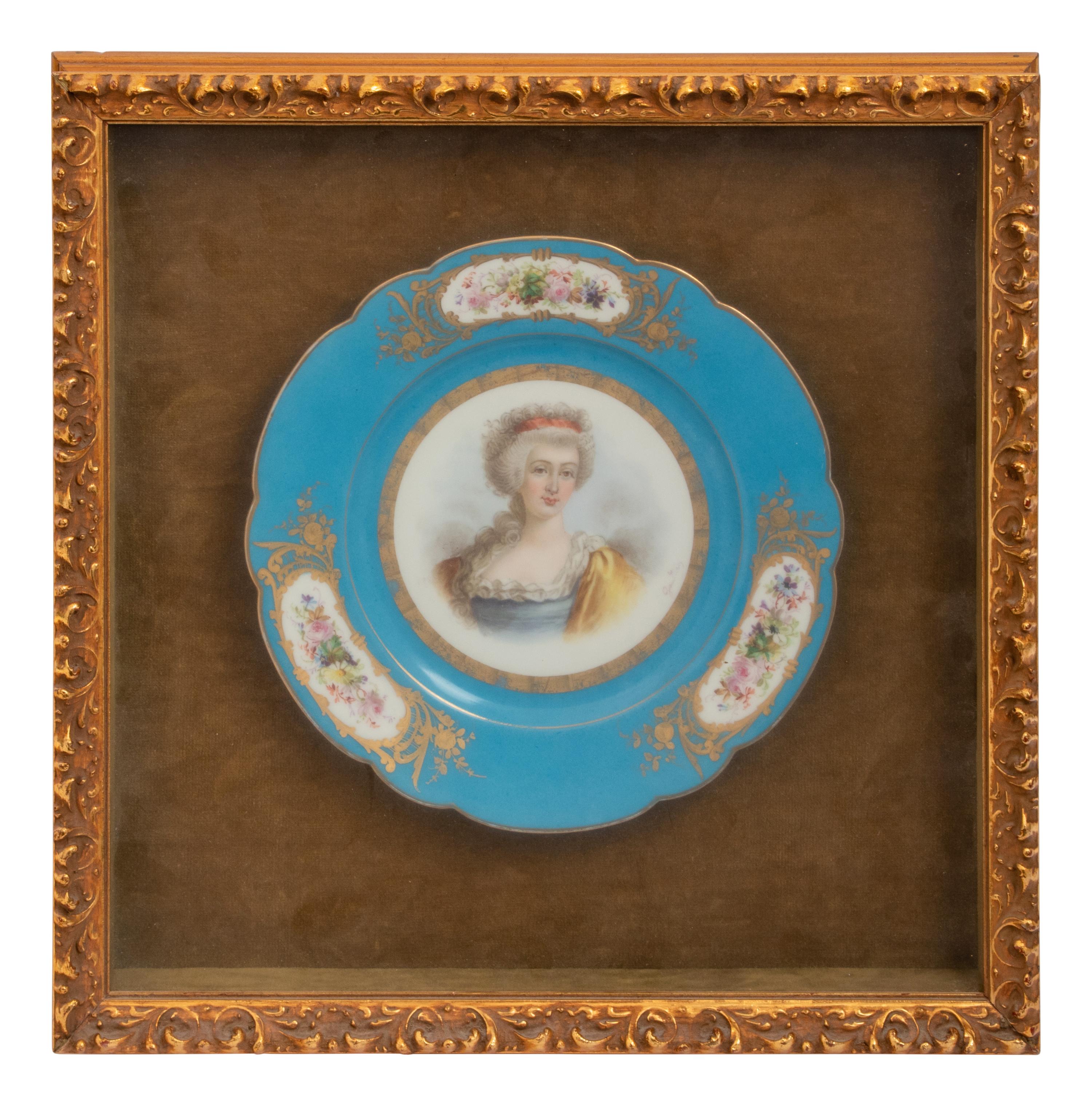 A Group of Seven Framed Sèvres Style Porcelain Plates
