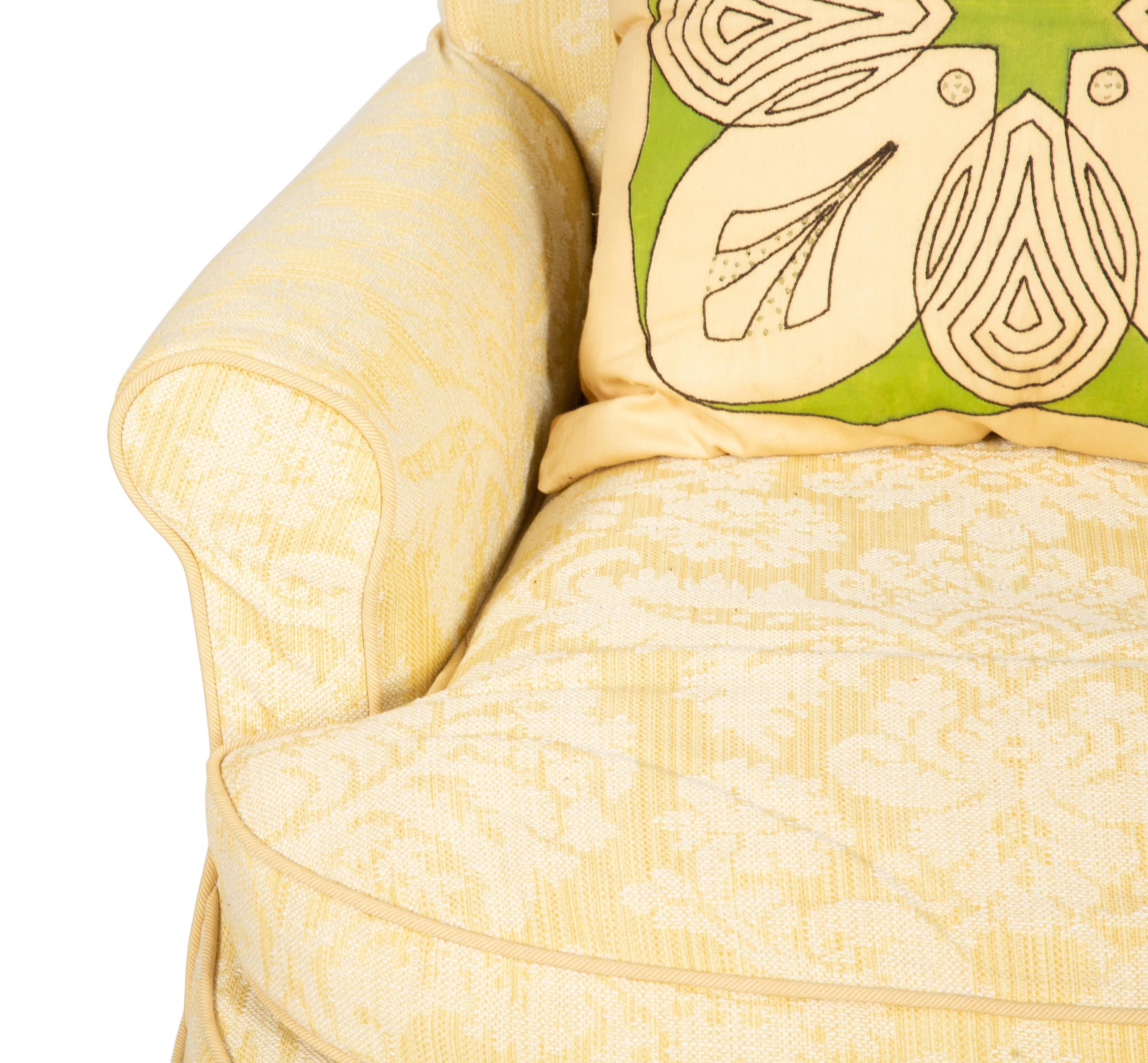 A Yellow Cotton-Slip Covered Club Chair