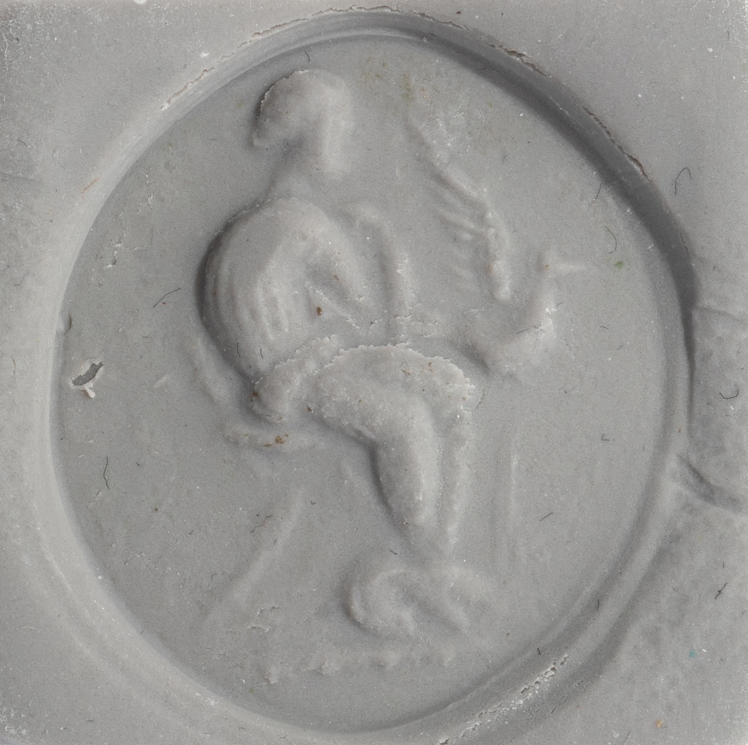 A Greek Bronze Finger Ring with Leda and the Swan or Aphrodite and her Dove