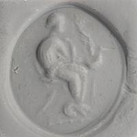 A Greek Bronze Finger Ring with Leda and the Swan or Aphrodite and her Dove