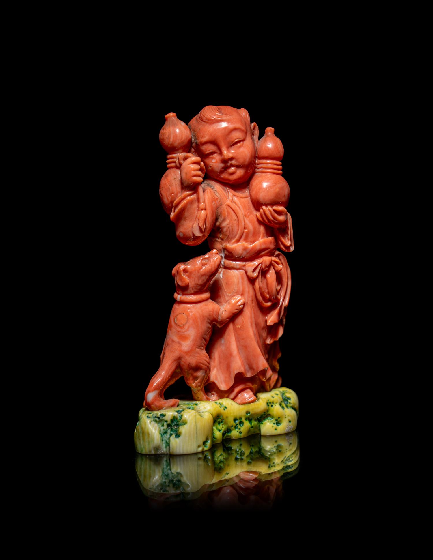 A Chinese Coral Figural Group of a Boy and a Dog