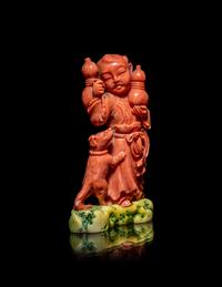 A Chinese Coral Figural Group of a Boy and a Dog