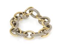 A Sterling and Yellow Gold Link Bracelet, 40.30 dwts.