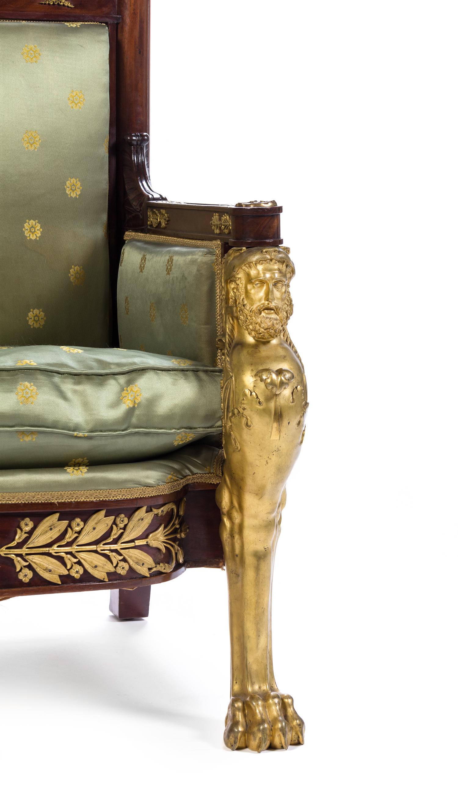 An Empire Gilt Bronze Mounted Mahogany Bergere Height 40 inches. — EARLY 19TH CENTURY