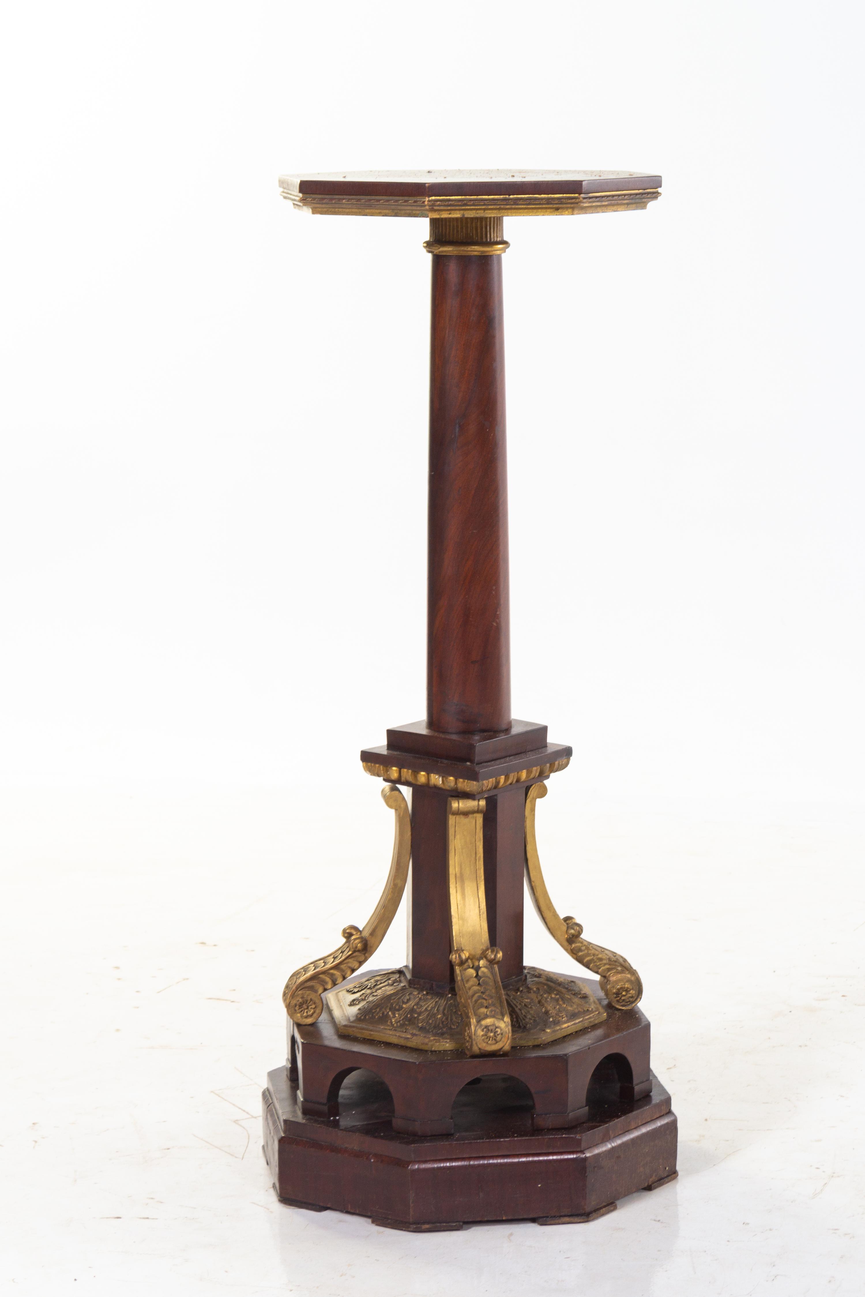 A Parcel Gilt Mahogany Pedestal