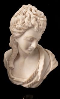 A Set of Four Italian Marble Busts of Women