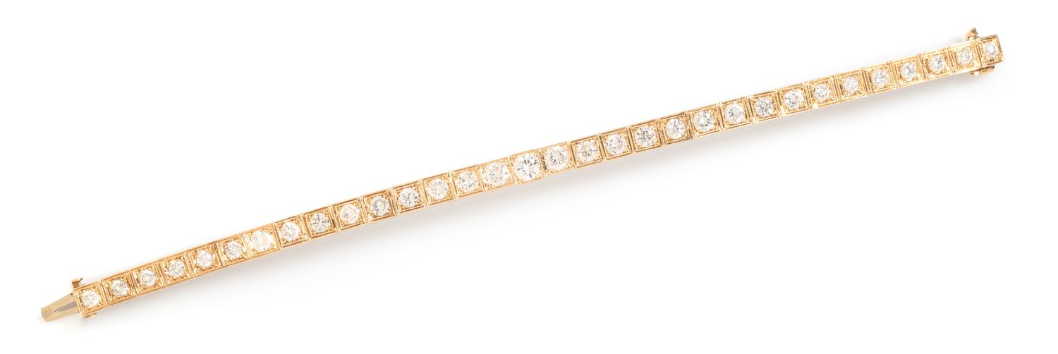 A 14 Karat Yellow Gold and Diamond Line Bracelet, 10.70 dwts.