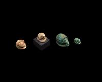 Four Egyptian Faience and Jasper Hedgehog Scaraboids