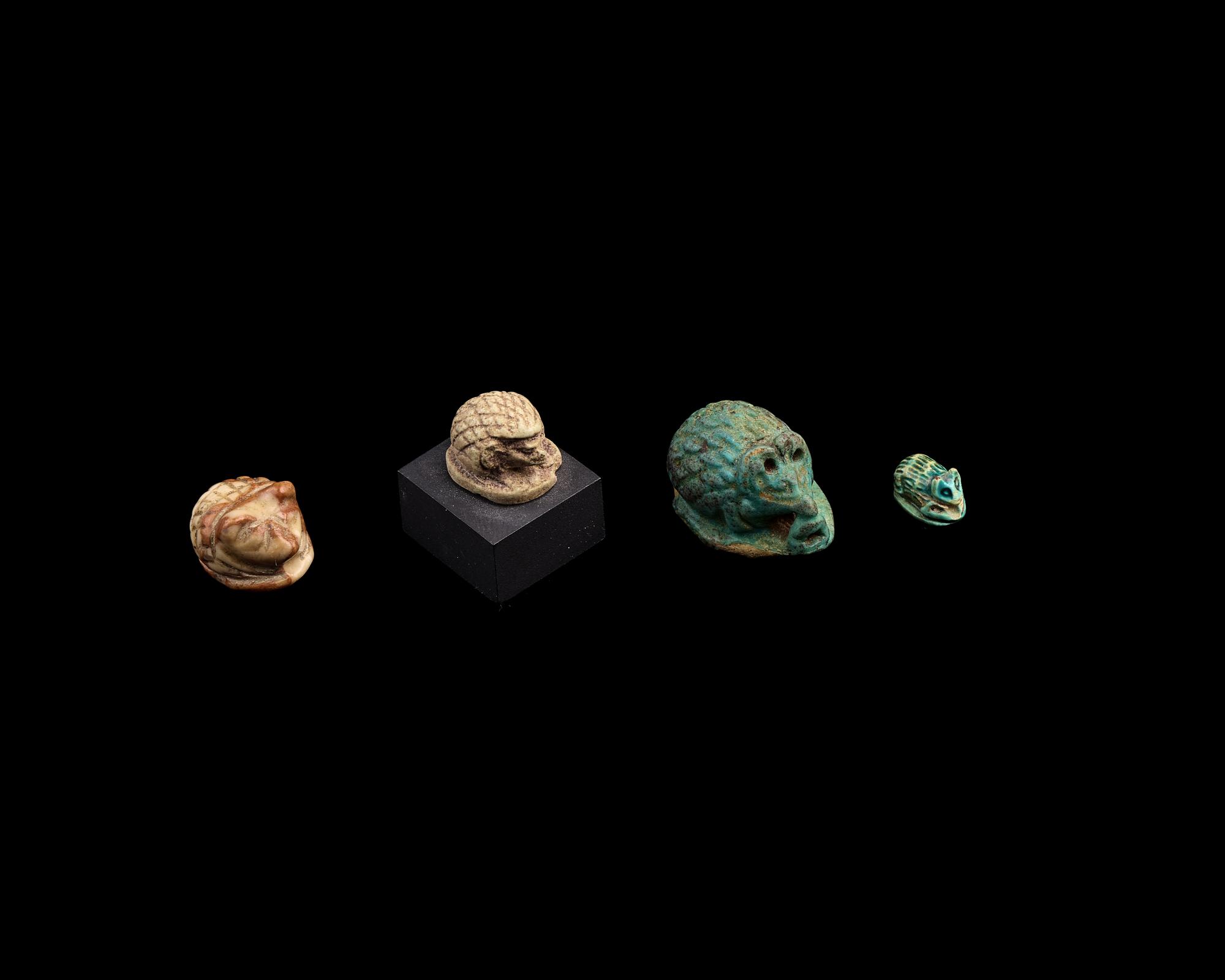 Four Egyptian Faience and Jasper Hedgehog Scaraboids